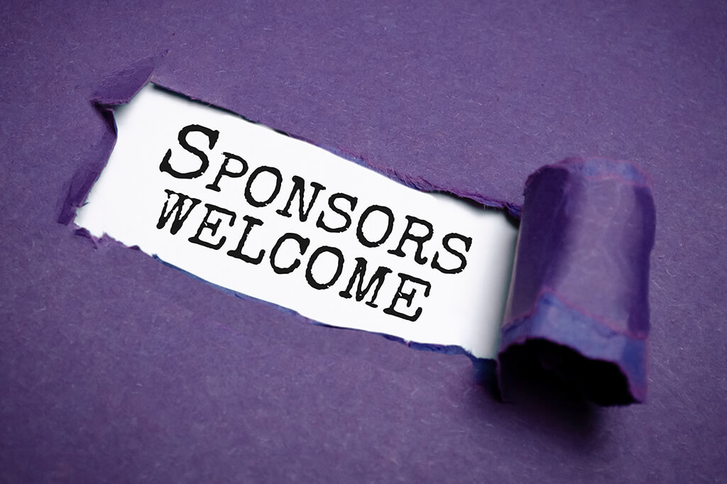 The words "Sponsors Welcome" on a purple cardboard texture